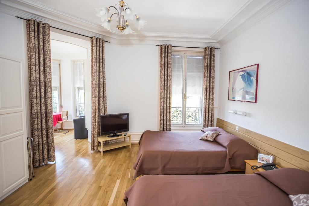 Hotel Des Tourelles Genebra Quarto foto